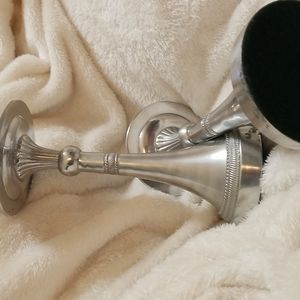 Two silver metal candle holder